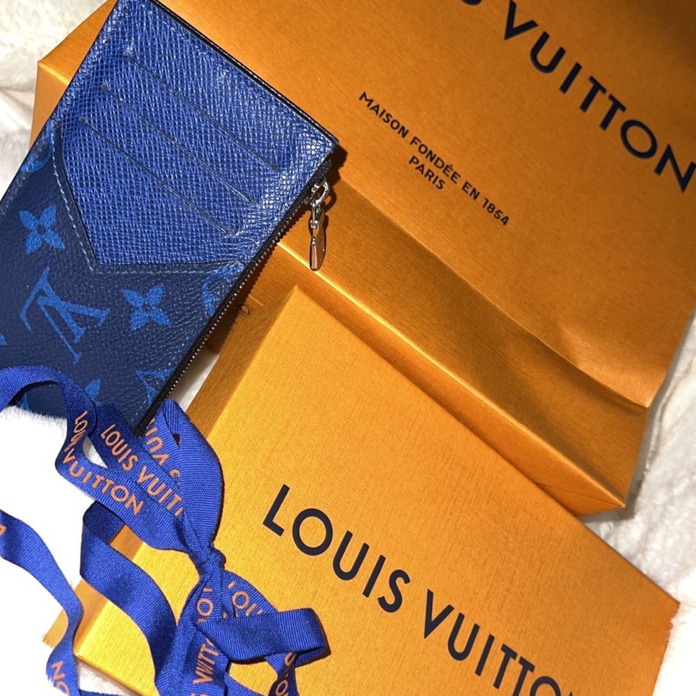 Louis Vuitton wallet! It is real, I have the receipt which will be sent.